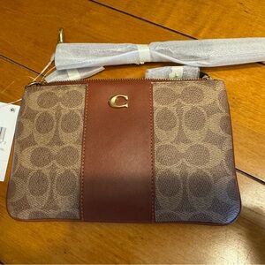Coach Signature Brown and Tan Clutch